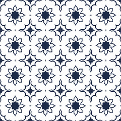 Fototapeta premium Elegant Blue and White Tile Pattern with Ornamental Floral Details