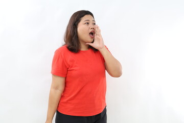 Surprised happy beauty asian woman looking camera in excitement expressive facial expressions. Presenting some product, telling someone gesture. Isolated on white background