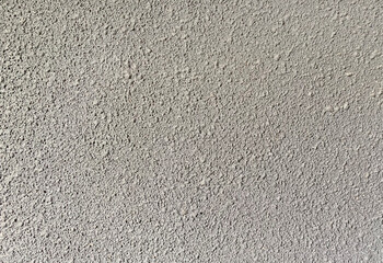 White textured paint, or light grey color. rough textured paint on wall, seamless background texture	