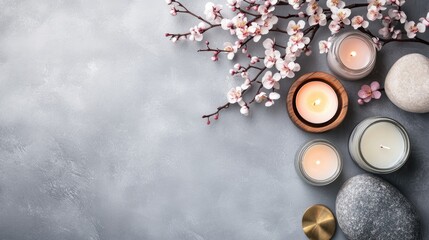 Relaxing spa environment with an orchid, soft towels, candles, and therapy tools inviting a sense of calm and rejuvenation