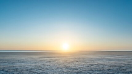 Obraz premium Serene Sunset Over a Frozen Expanse of Land