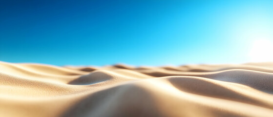 Naklejka premium A serene view of undulating sand dunes under a bright blue sky, capturing the essence of desert tranquility.