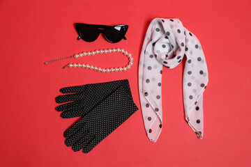 Stylish accessories on red background, flat lay © New Africa