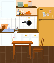 The interior of a modern kitchen with a fridge countertop, sink and dining table.