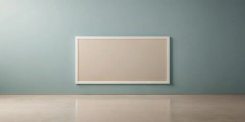 A large, blank canvas in a simple white frame hangs on a pale teal wall above a polished concrete floor.