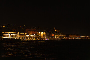 Night harbor lights reflecting on the water