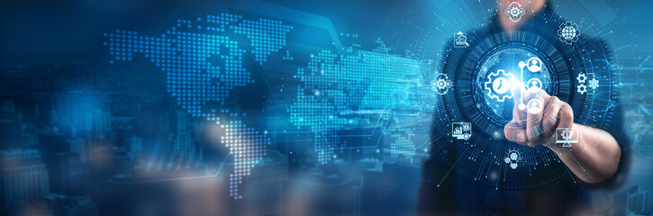 Businessman touching Enterprise Resource Planning (ERP) interface system technology, automated...
