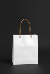 White paper shopping bag, minimalist design, clean lines, rope handles, dark background, studio lighting, high contrast, product photography, simple elegance