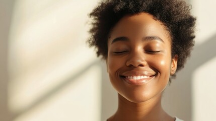 Person smiling with eyes closed bright background clean layout copy space