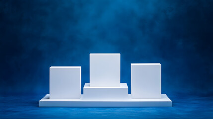 Square podiums are white. Abstract background. A stage for the demonstration of cosmetics. Podium for the award, consisting of three 3 square figures of different sizes on a blue background. Showcase