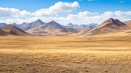 Expansive Mountain Range Under A Clear Blue Sky