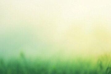Soft focus on lush green grass with a serene blurred background, evoking tranquility and nature