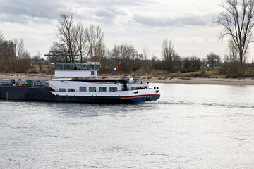 Inland tanker on the Rhine near Biebesheim in Hesse in winter