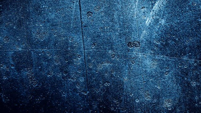 wall painted with blue paint with an interesting texture