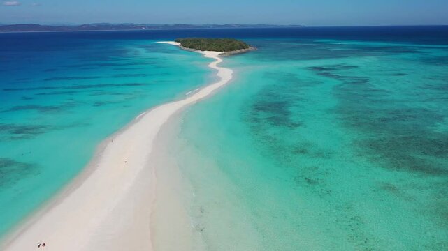 Aerial view of beautiful Nosy Iranja beach with turquoise water and pristine sand, Diana, Madagascar.