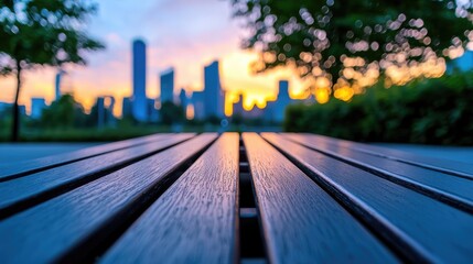 Fototapeta premium Park bench sunset city skyline view