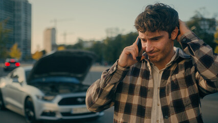 Confused anxious man rich businessman guy male driver broke car on road talk mobile phone call service tow truck assistance vehicle breaking problem with automobile transport insurance auto in city