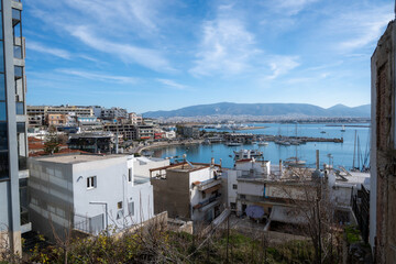 View of the Mikrolimano port at Piraeus-Greece on a sunny day with blue cloudy sky. 