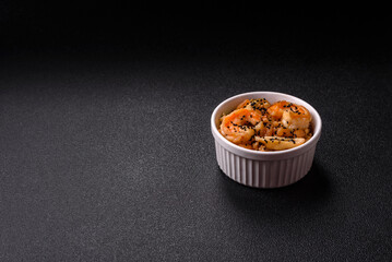 Rice with shrimps and seafood, vegetables, spices and soy sauce