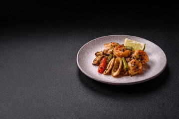 Rice with shrimps and seafood, vegetables, spices and soy sauce