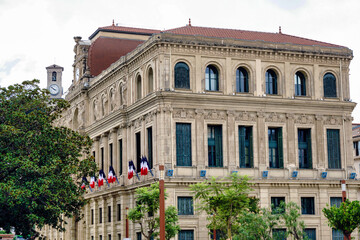Obraz premium City town hall municipality buildings and castle tower with clock in Cannes, France