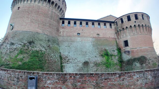 Moss covering the medieval walls of Dozza Castle, a historic fortress in the picturesque village of Dozza, Emilia Romagna, Italy, known for its painted walls and wine cellars