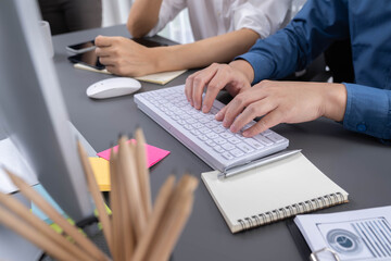Group of diverse office worker employee working together on strategic business marketing planning on office workspace desk. Productive teamwork in business workplace concept. Prudent