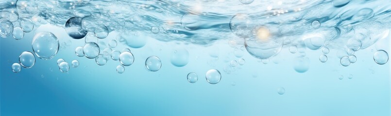Bubbles ascend gracefully through clear water, creating a tranquil atmosphere. The soothing blue background enhances the calming effect of this underwater phenomenon