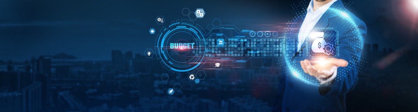 Budget: Businessman holding financial icon and data exchanges representing secure connection on city background, cost management, expense tracking, financial planning, and resource allocation.