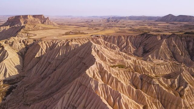 Aerial view of bardenas reales desert with unique rock formations and dry valley, Navarra, Spain.