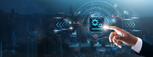 Work In Progress: Businessman’s hand touching futuristic technological interface, project...