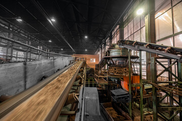 Fototapeta premium Automated brick production conveyor belt transport in industrial setting