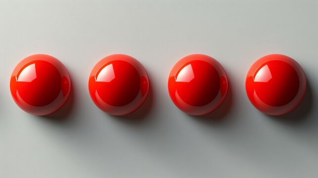 Four red balls are arranged in a row on a white background