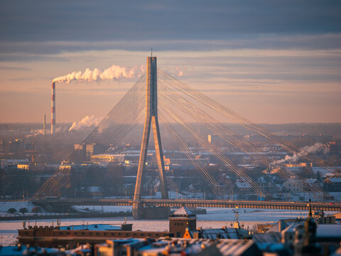 Rīga city center, downtown. View on cable suspension bringe (Van&scaron;u tilts) over Daugava river in winter.