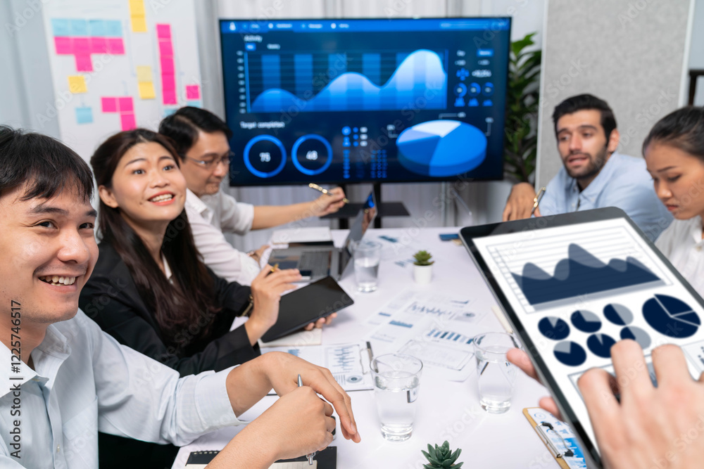 Fototapete analyst team uses bi fintech display tablet to analyze financial data . business people analyze bi s