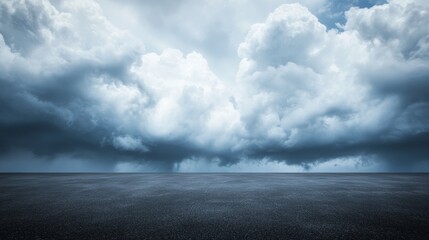 Obraz premium Dramatic Sky Background with Storm Clouds and Dark Asphalt Floor