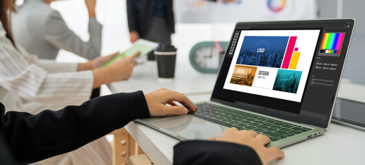 Graphic designer software for modern design of web page and commercial ads showing on the computer...
