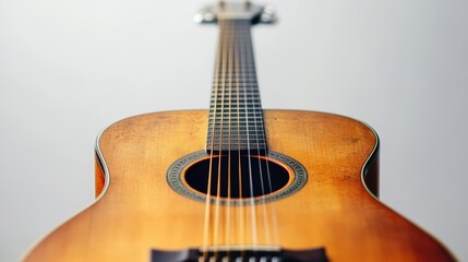Obraz premium Acoustic guitar close up on white background
