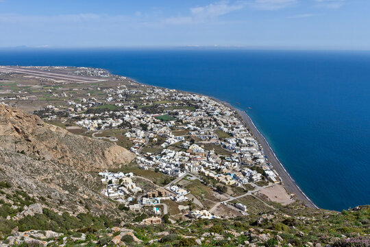 View from Ancient Thira overlooking Kamari and the Aegean Sea in Santorini, Greece. A historic site with stunning coastal and volcanic landscapes.