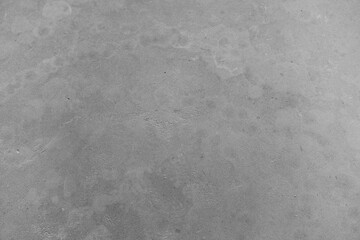 Naklejka premium Textured grey concrete surface offers a minimalist aesthetic