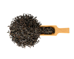 herbal tea in wooden spoon on white background