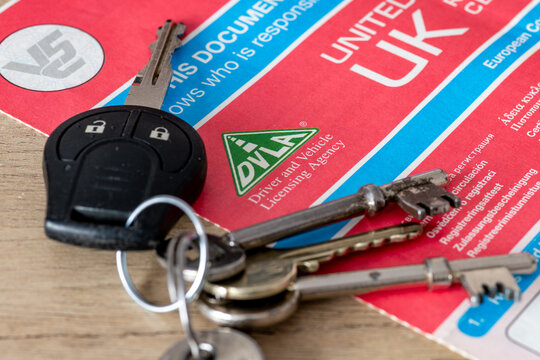 London. UK- 01.24.2025. Close up of a UK government V5C vehicle log book issued by the Drivers and Vehicle Licensing Agency.