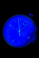 citizen mechanical watch lies on a black background
