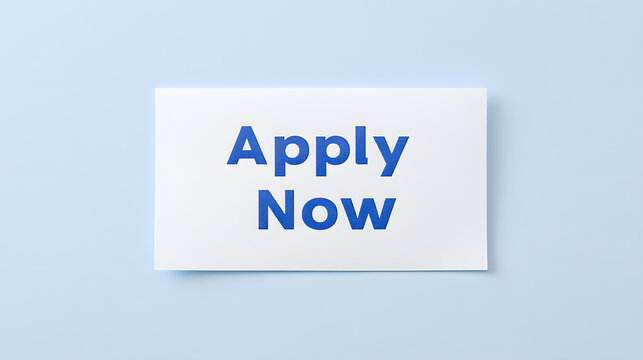 Apply Now' text written on white paper, isolated against a light blue background, emphasizing urgency and opportunity