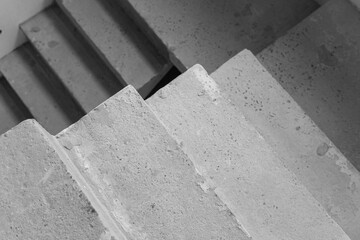 Concrete staircase leading to upper levels in a modern building structure
