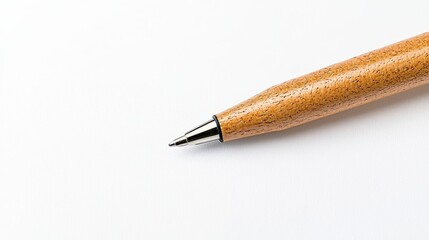 Elegant Wooden Pen on Textured White Surface