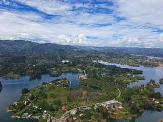 Fototapeta premium Panoramic summer view of Lake Bled, the city of Kotor, and Croatia's picturesque coastline under a blue sky