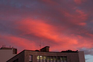 Pink and Purple Sunset Sky with Clouds and Silhouettes