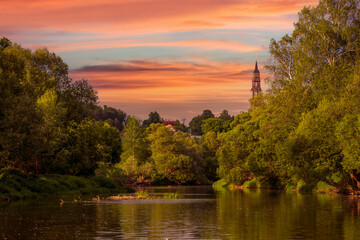 Beautiful summer sunset landscape with the bell tower of the Church of St. John the Baptist, Serpukhov district, Moscow Oblast, Russia