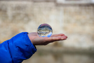 Reflection of Amasya historical houses from inside the globe